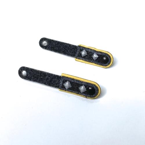 Product image of the product “Schulterklappen gelb Stoff  1/6 ”