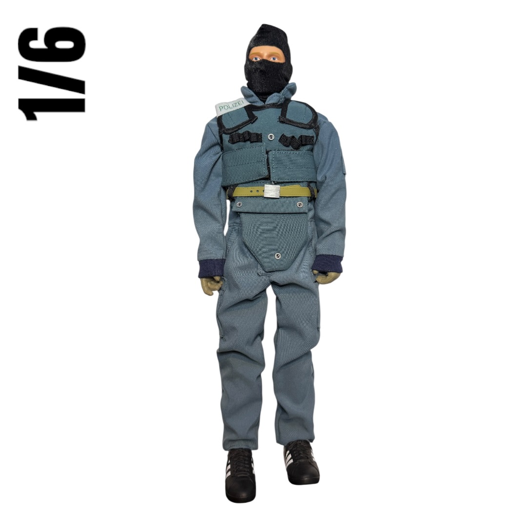  Artikelbild 1 des Artikels “GSG 9 Figur mit Einsatzkombi Polizei Graublau 1/6 “
